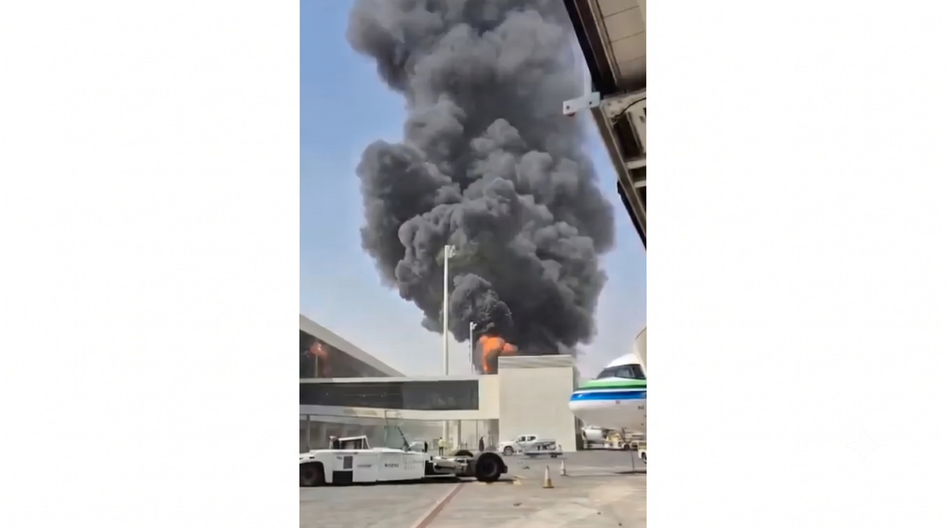 This image from video obtained and verified by AP shows thick black smoke and flames rising from a fire at King Khalid International Airport in Riyadh, Saudi Arabia, Friday, Oct. 9, 2026. Photo by AP