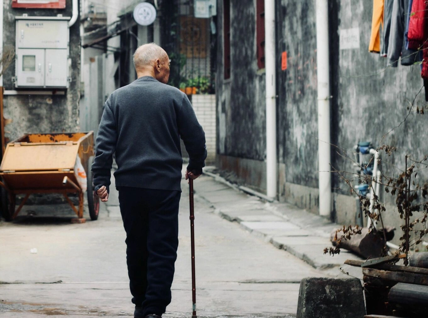 A senior man walking with a cane in Guangdong, China. Illustration photo by Pexels/Eric Cheng