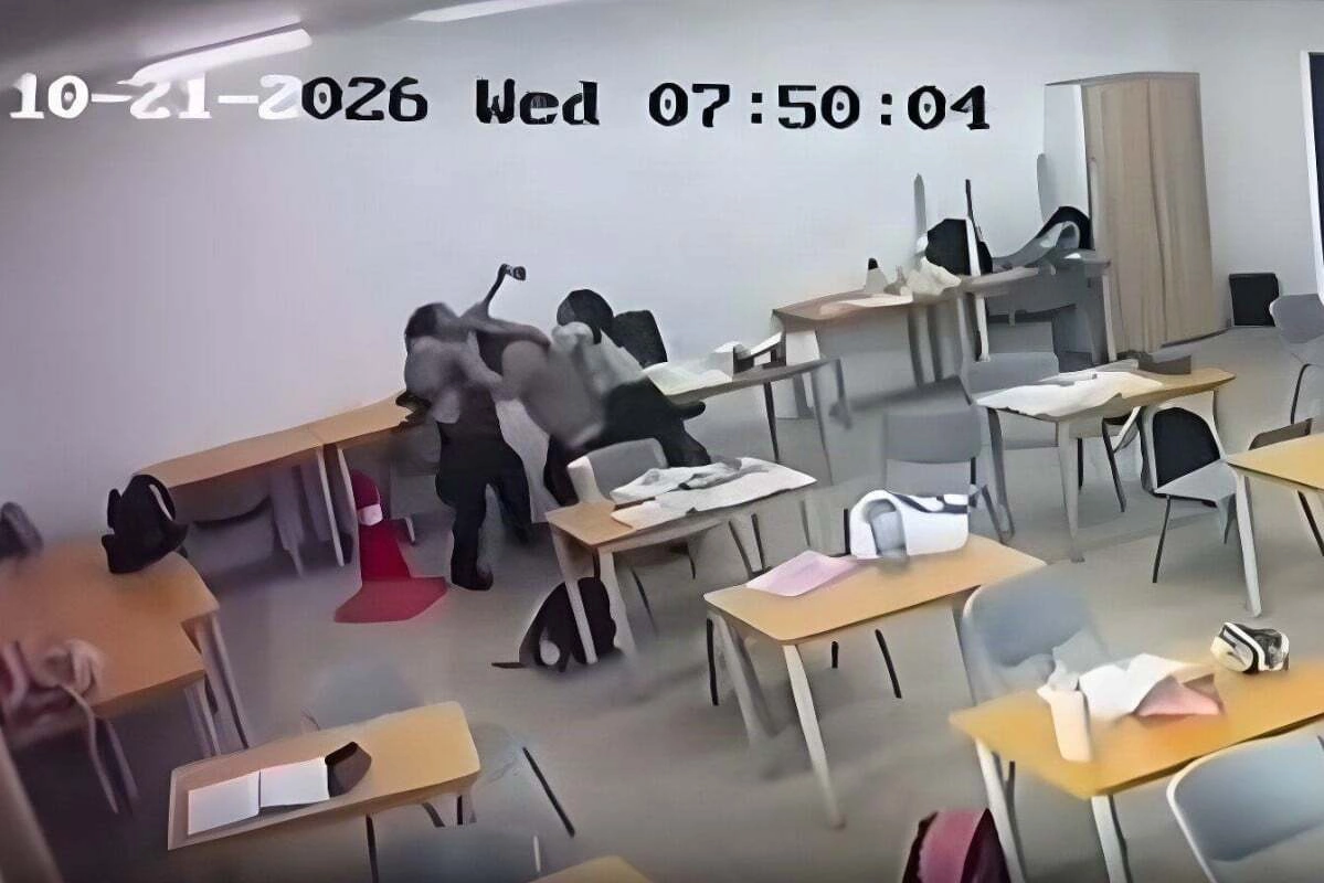 Screengrab of a video footage shows a student being incapacitated during an axe attack inside a classroom in Malaysia. Photo courtesy of Reddit