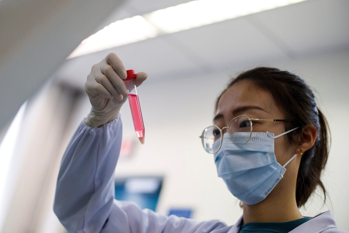 A scientist works in the lab of Linqi Zhang, researching antibodies for possible use in treatment of Covid-19, at Tsinghua Universitys Research Center for Public Health in Beijing on March 30, 2020. Photo by Reuters