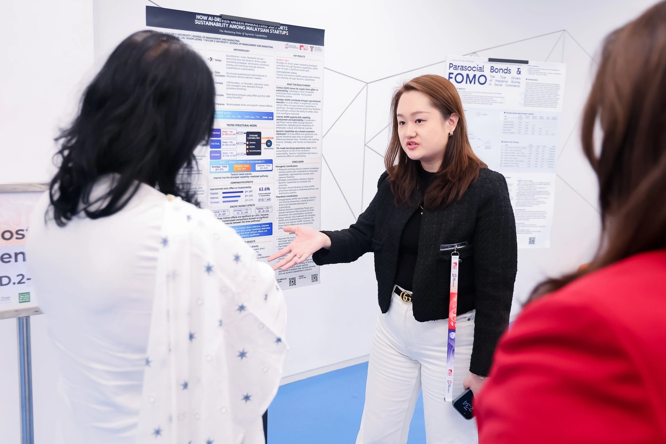 Tan Yin Yee from Taylors University, Malaysia, presents research on AI-driven green marketing among technology start-ups during the poster session at SIBE 2026. Photo courtesy of BUV