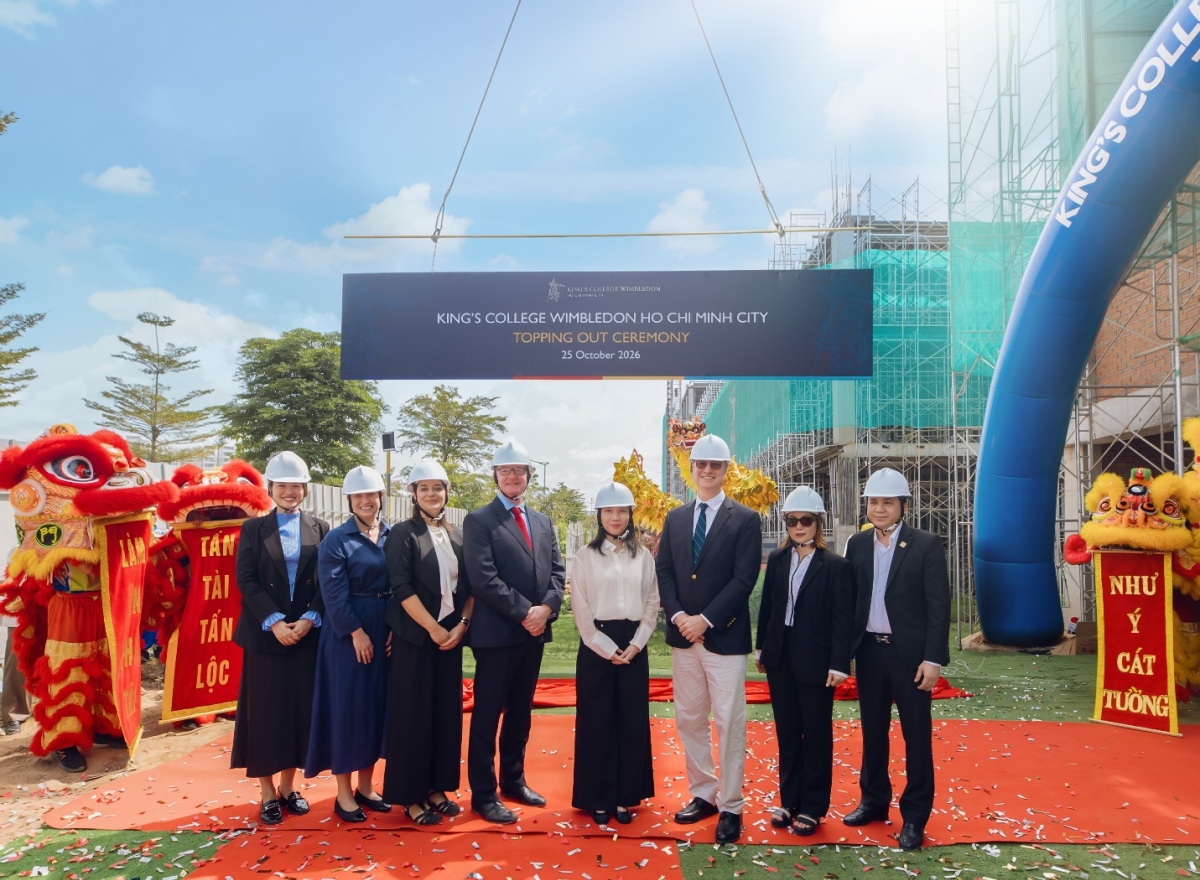 Representatives of Kings HCMC and its development partners discuss the campus design and construction progress. Photo courtesy of the school