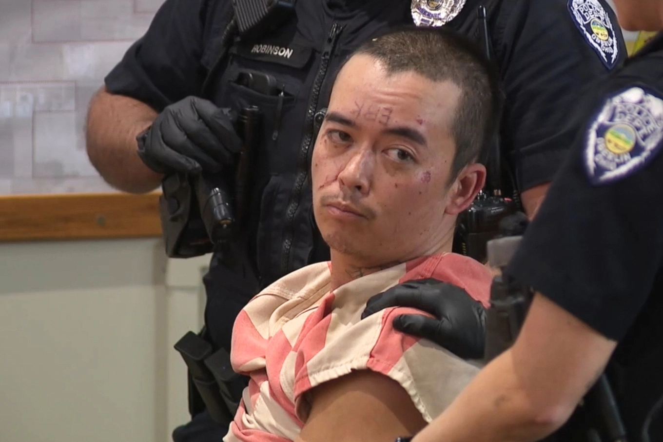 In this image from video provided by WEWS, Asia Nguyen-Duy, previously known as Daniel Jones, appears in Oberlin Municipal Court, in Oberlin, Ohio, Thursday, Oct. 29, 2026. Photo by AP